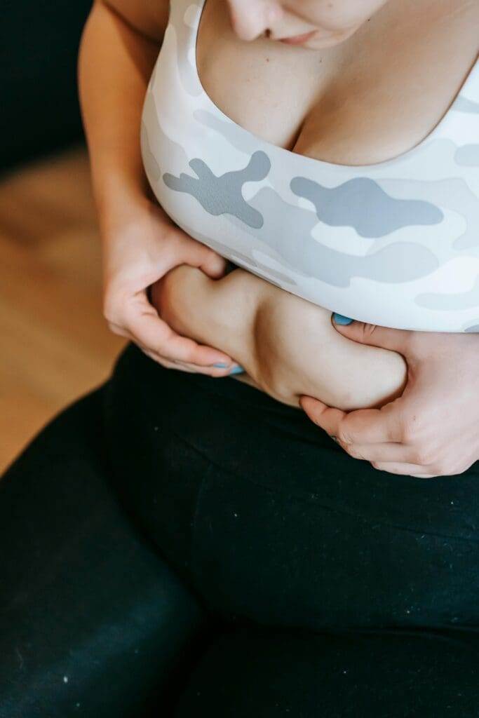 Woman experiencing bloating and digestive discomfort