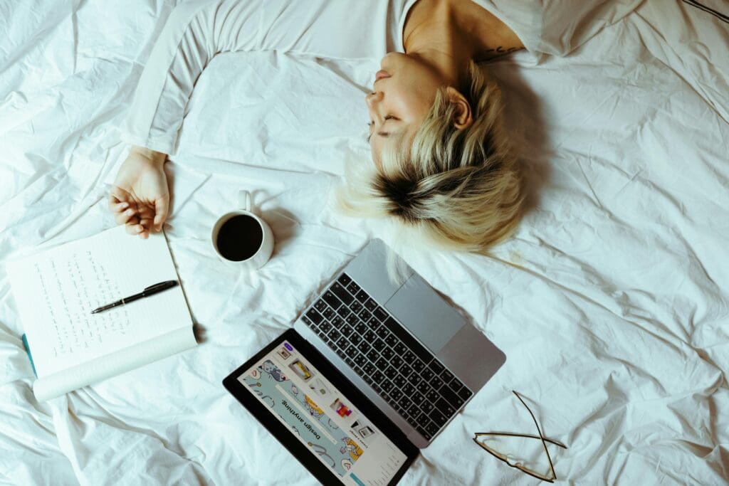 Woman relying on coffee to fight fatigue and energy crashes